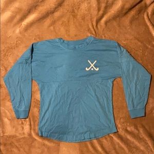 Blue long sleeved field hockey shirt